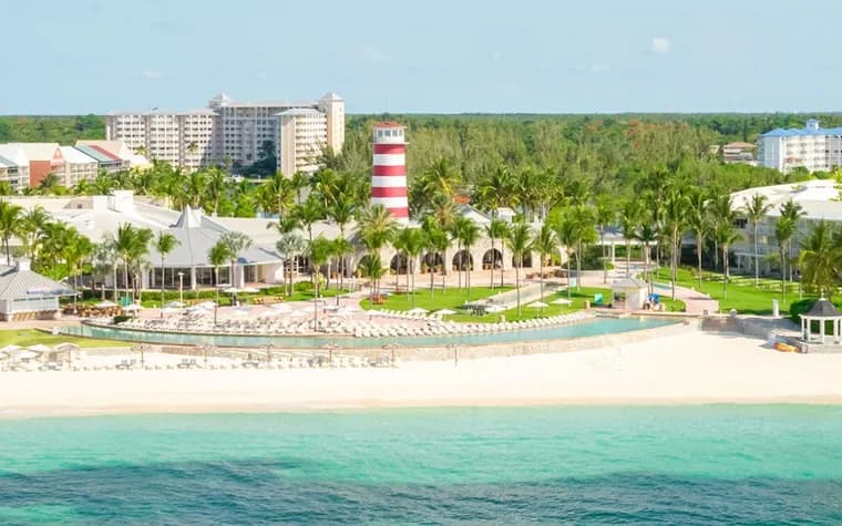 The striped lighthouse and beachfront resort at Port Lucaya, Freeport, Grand Bahama