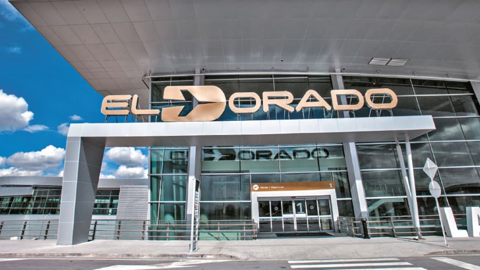 The illuminated entrance of El Dorado International Airport (BOG) in Bogotá, Colombia