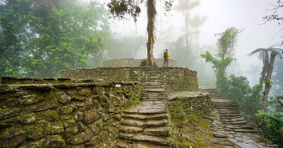 Mist-shrouded stone terraces of Ciudad Perdida on the Lost City trek