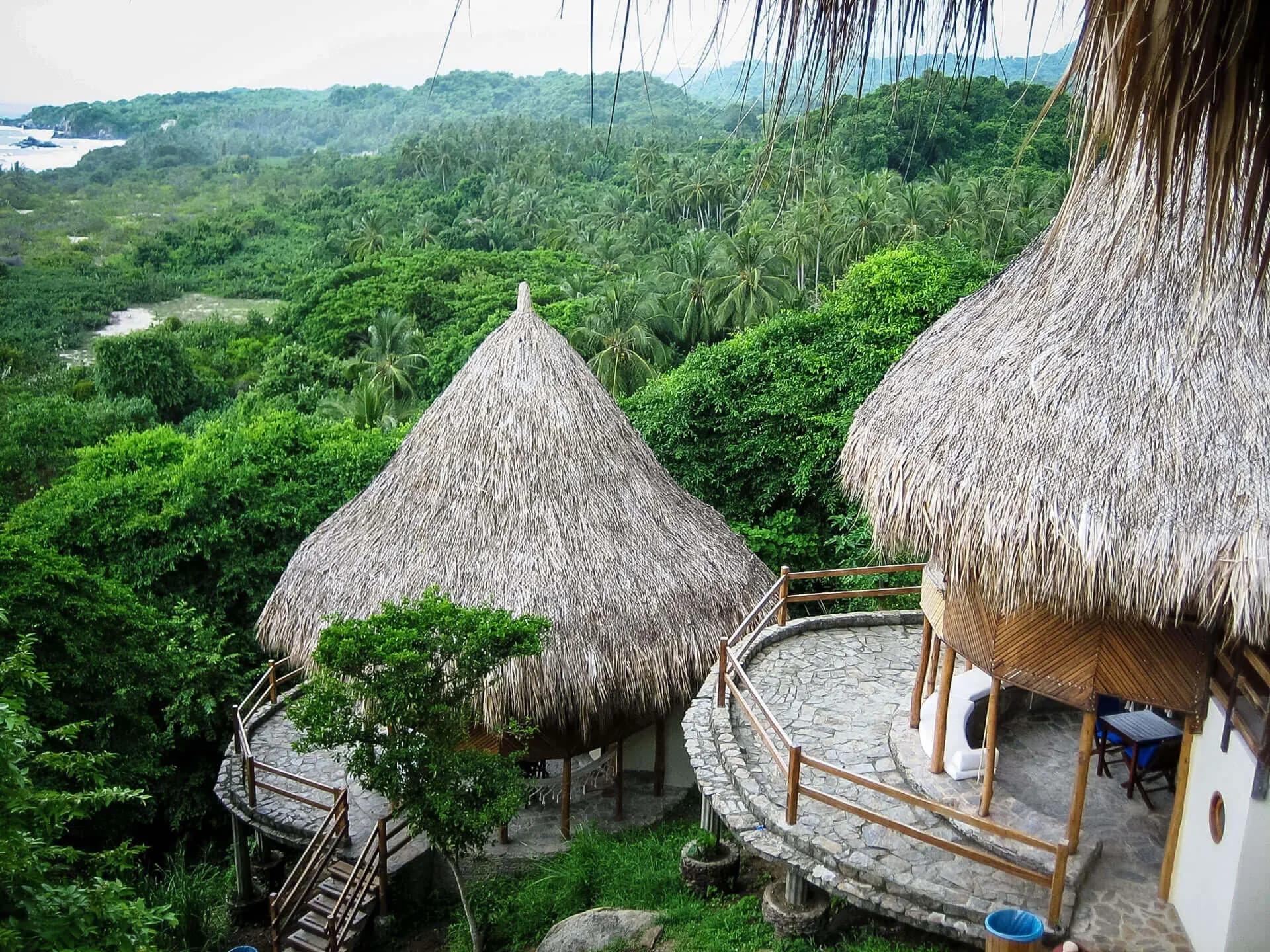 Thatched eco-lodges overlooking the jungle canopy in Tayrona National Park