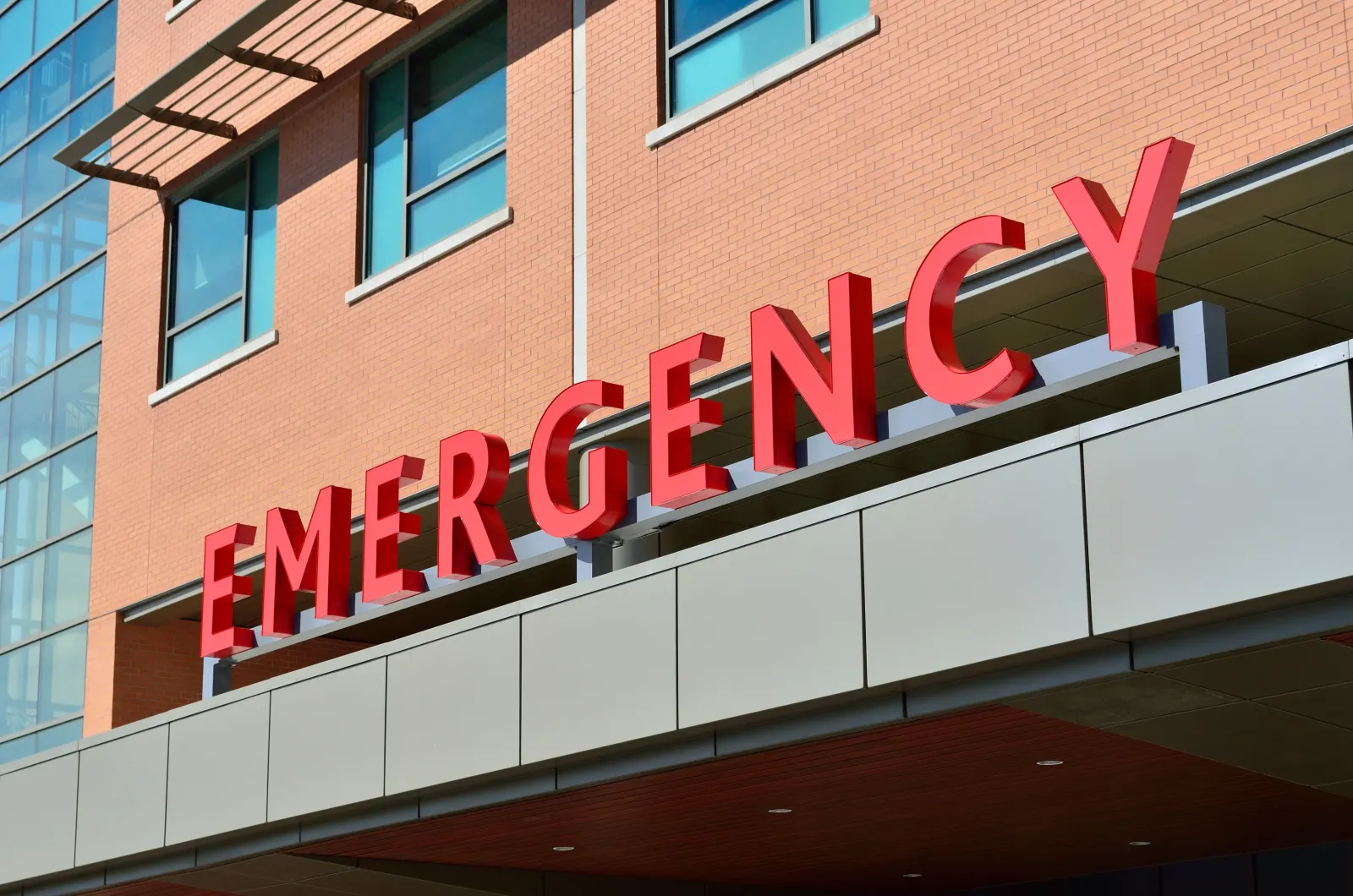 Red emergency sign at a hospital entrance in St. Kitts