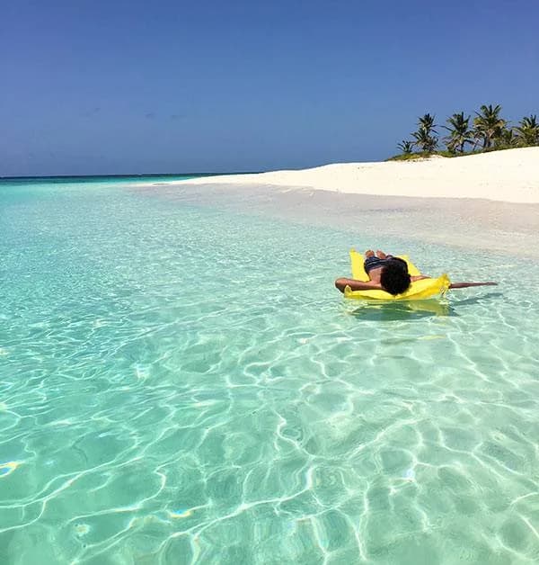 Soft white sand and clear shallow water at Shoal Bay East, Anguilla