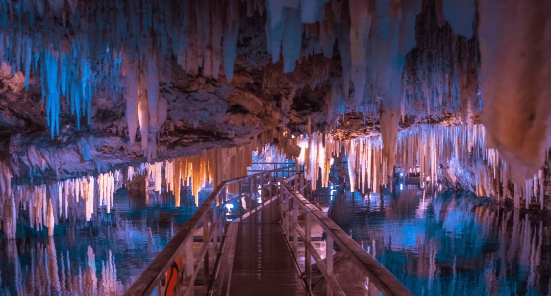 Underground crystal formations and turquoise pool at the Crystal Caves, Bermuda
