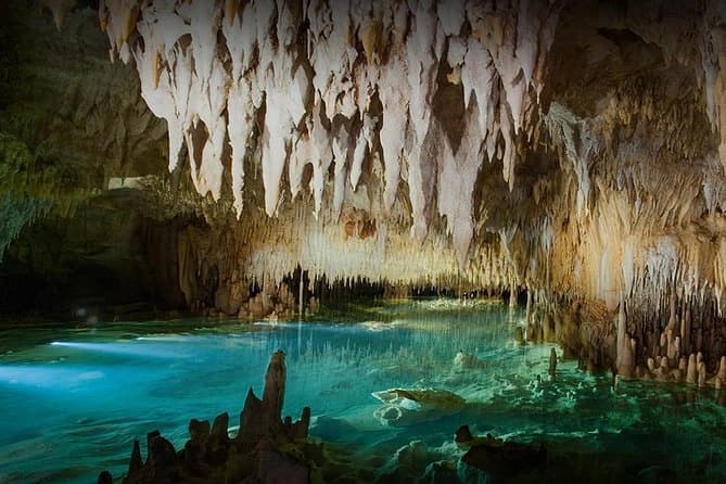 Stalactites and a pool inside the Cayman Crystal Caves, Grand Cayman