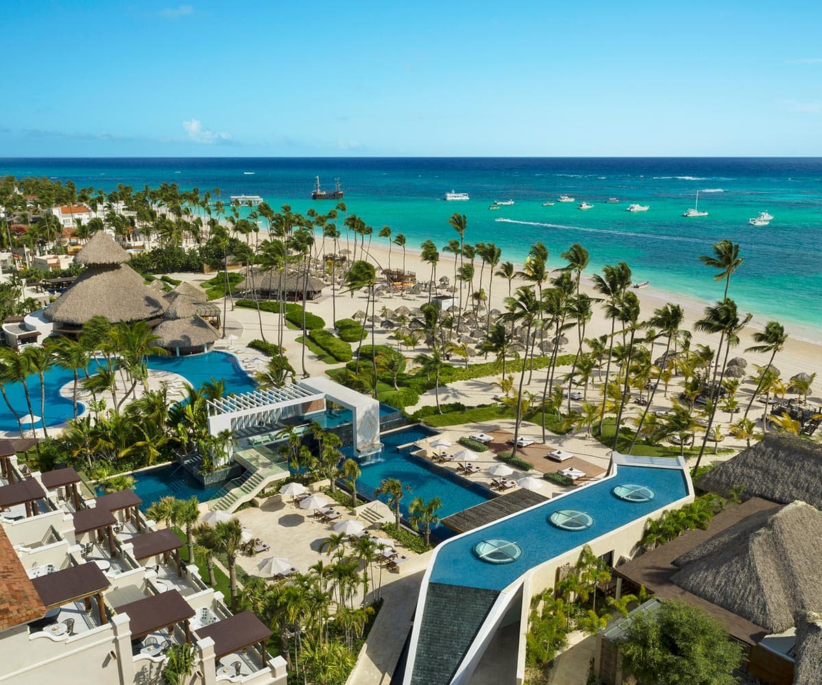 Aerial view of white-sand beach and turquoise Caribbean water at Punta Cana, Dominican Republic