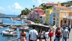Red-roofed guesthouses overlooking the Carenage harbour in the capital, St. George's, Grenada