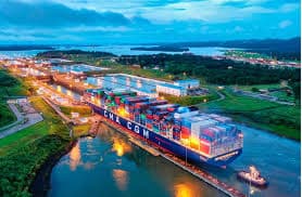 A cargo ship transiting the locks of the Panama Canal