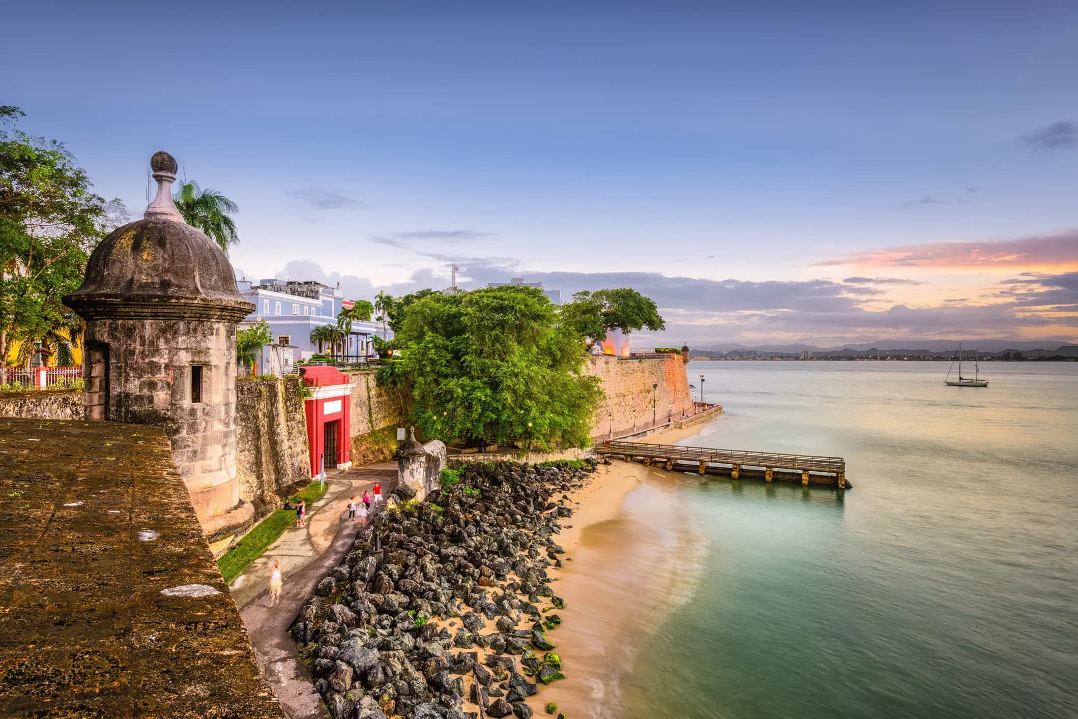 A sentry box on the old city walls of San Juan above the bay at sunset, Puerto Rico