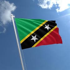 Flag of St. Kitts and Nevis, green, red, yellow and black with two white stars