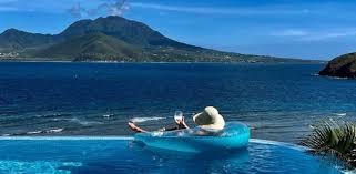 Upscale resorts and beaches on the South East Peninsula of St. Kitts with Nevis beyond