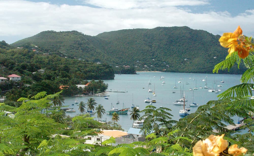 Admiralty Bay, Bequia, with sailboats at anchor and lush green hills