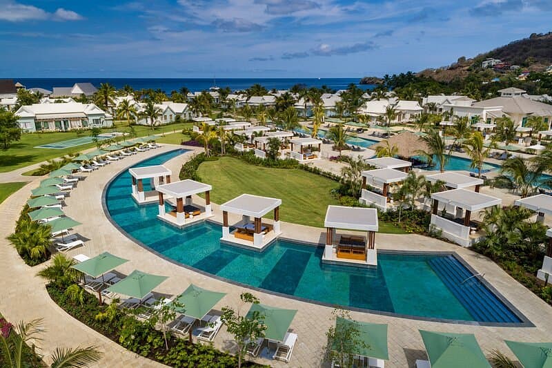 Luxury resort pool and villas at Mustique or Canouan, the Grenadines