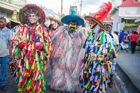 Mas Domnik Carnival — colourful costumed revellers parading through the streets of Roseau