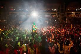 World Creole Music Festival — massive crowd under stage lights at the national open-air stadium, Dominica