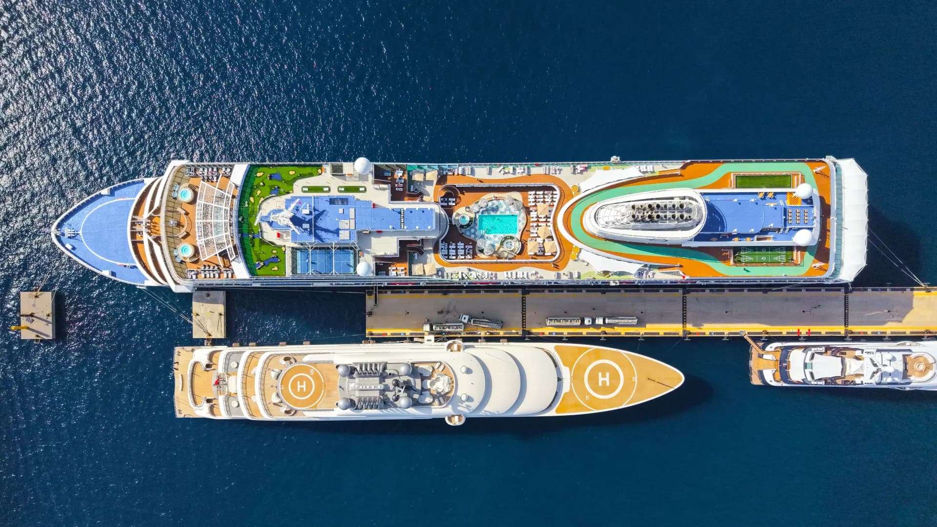 Cruise ships docked at the Oranjestad cruise terminal seen from above