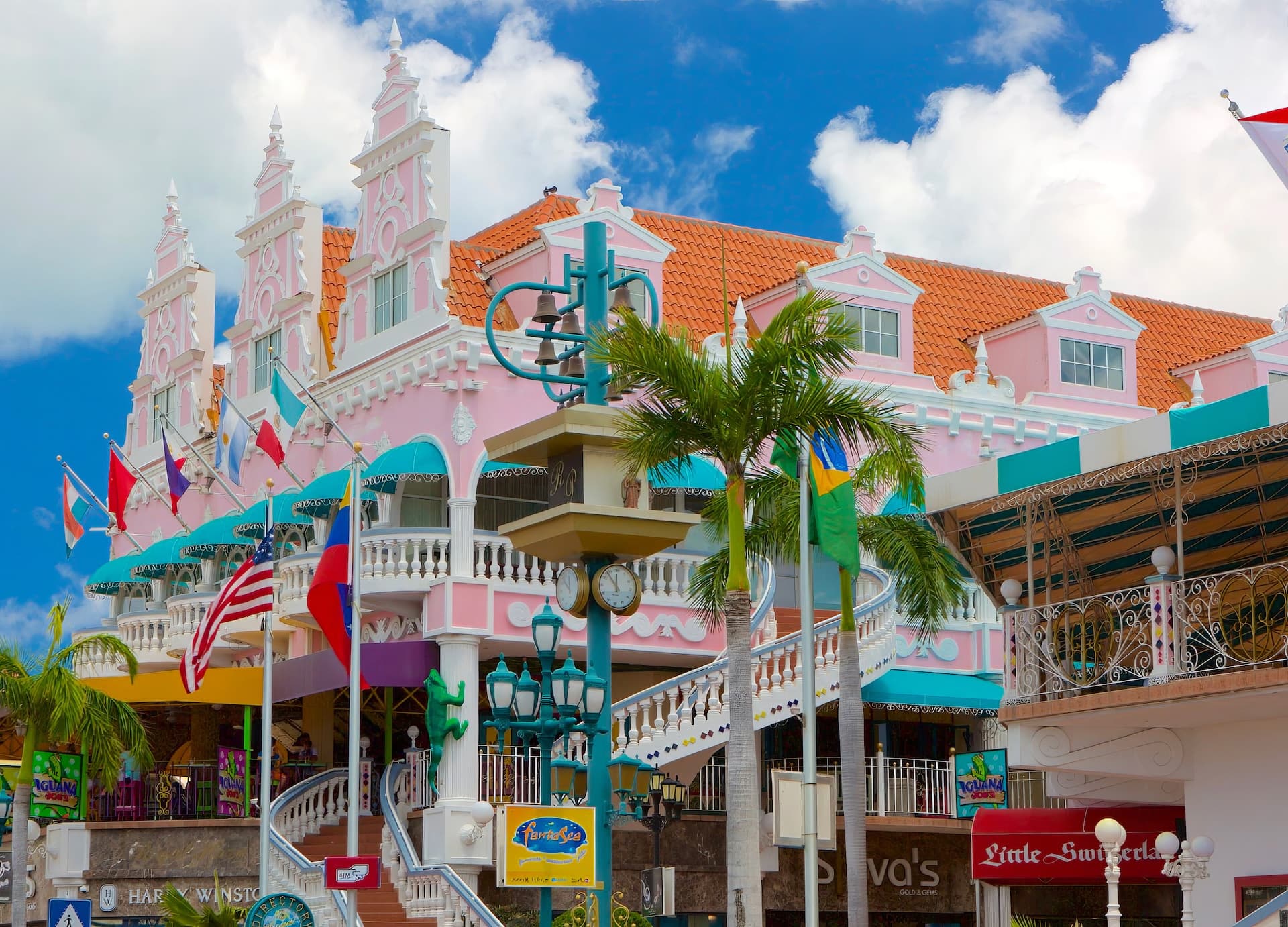 Pastel Dutch-colonial buildings and flags in downtown Oranjestad, Aruba
