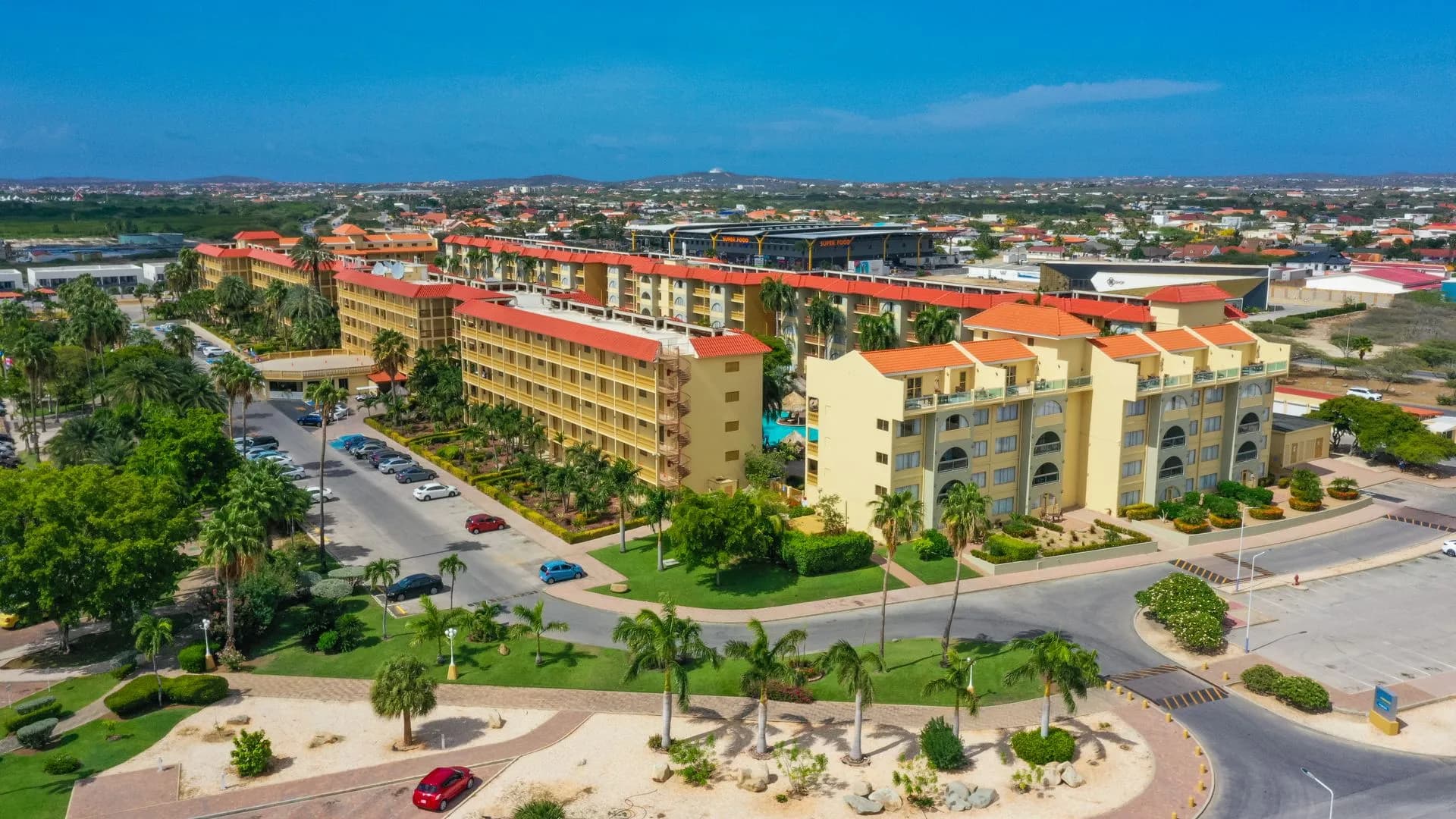 Low-rise beachfront resorts and turquoise water at Eagle Beach, Aruba