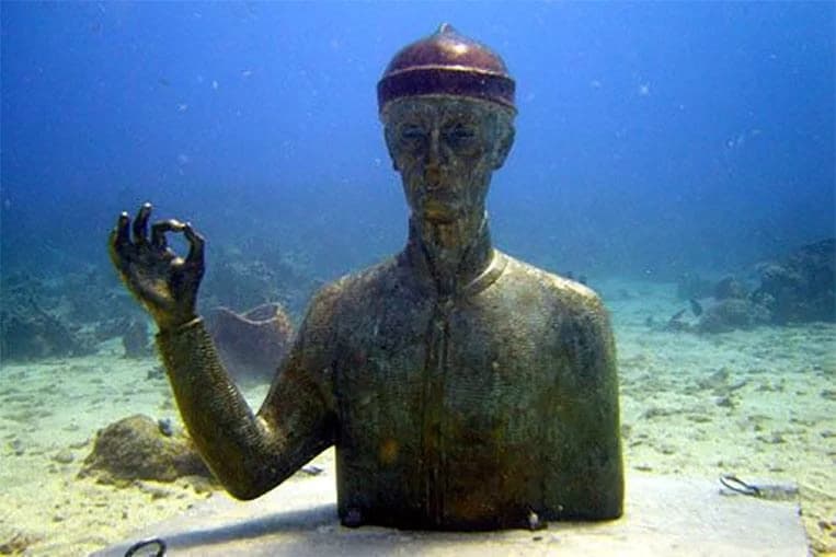 Underwater statue in the Cousteau Reserve off Pigeon Island, Guadeloupe