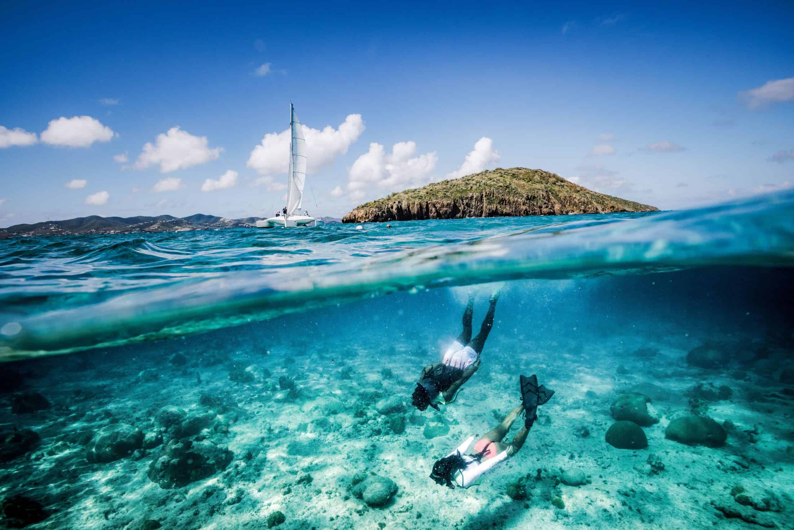 Snorkelers and catamaran at Buck Island Reef National Monument