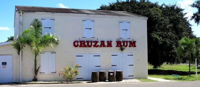 Cruzan Rum distillery building with rum barrels, St. Croix