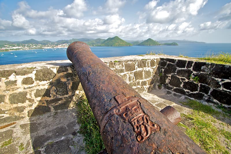 Historic rusted cannon atop the Fort Rodney ruins on Pigeon Island, overlooking Rodney Bay, Saint Lucia