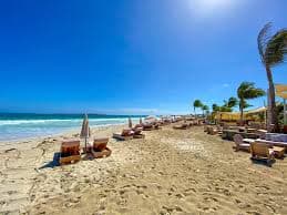 Turquoise water and beach at Orient Bay on the French side
